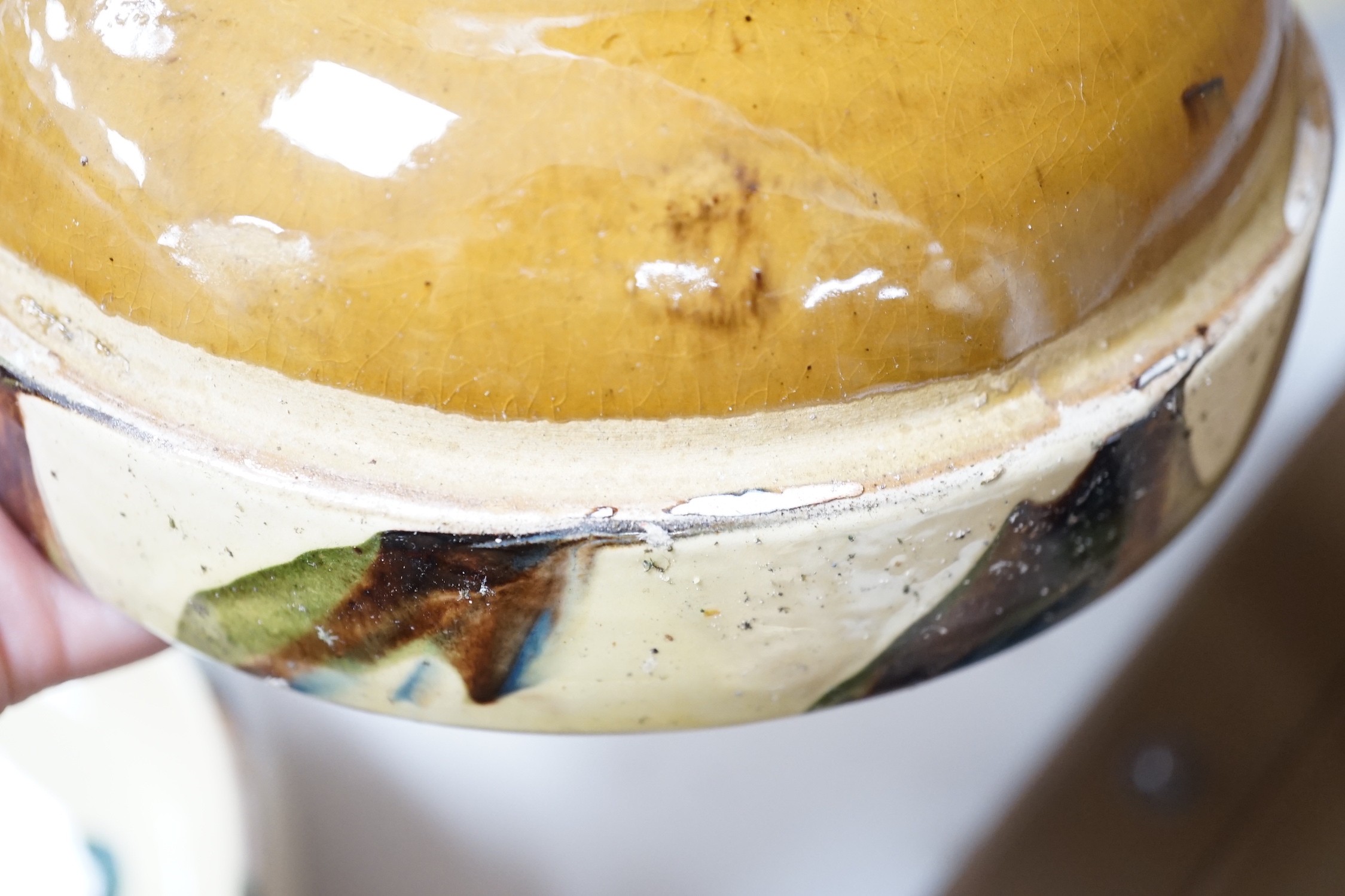 A set of six French provincial pottery bowls and a similar jug